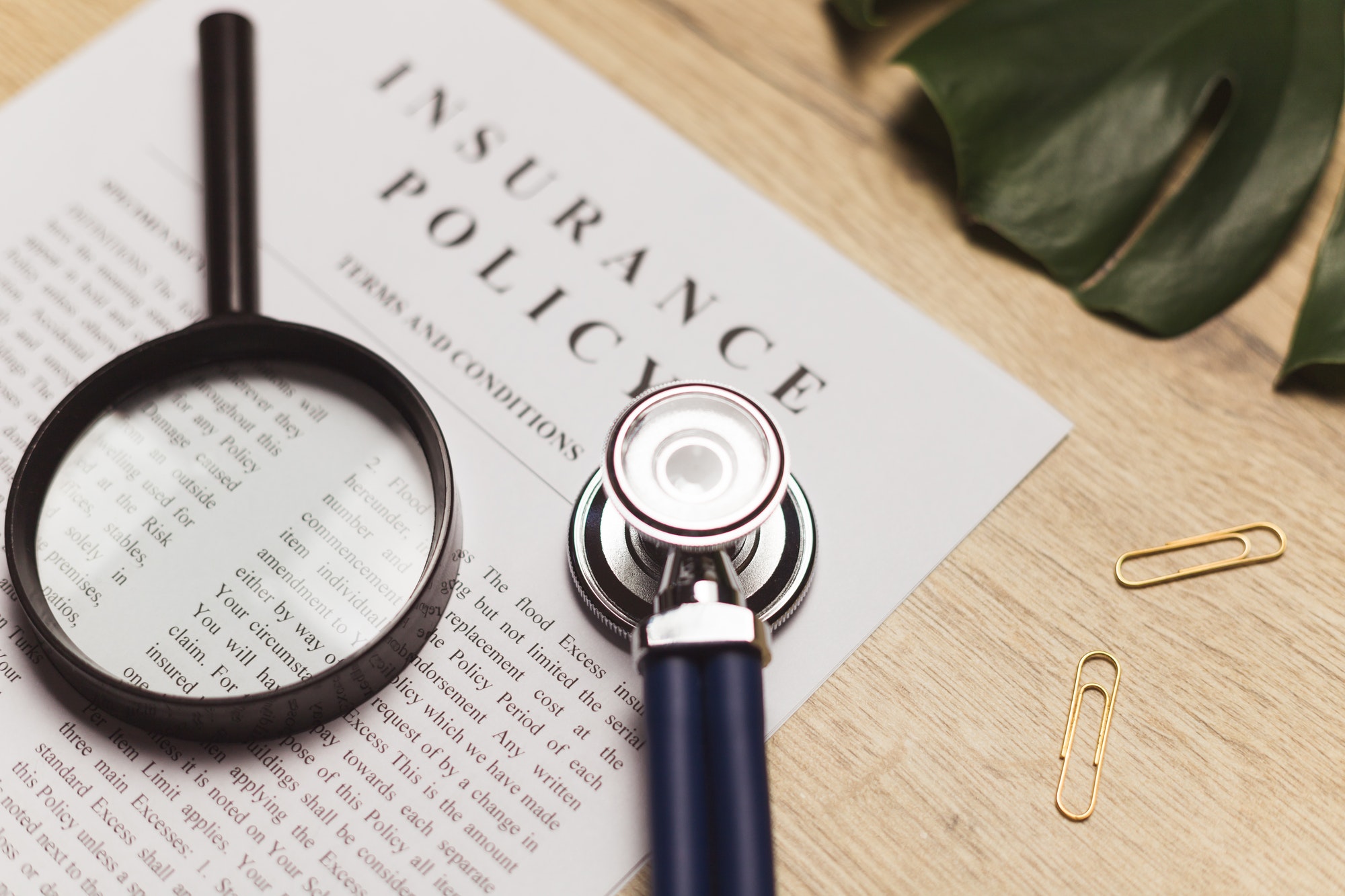 Doctor's stethoscope, medical record and health insurance document. Concept of healthcare.